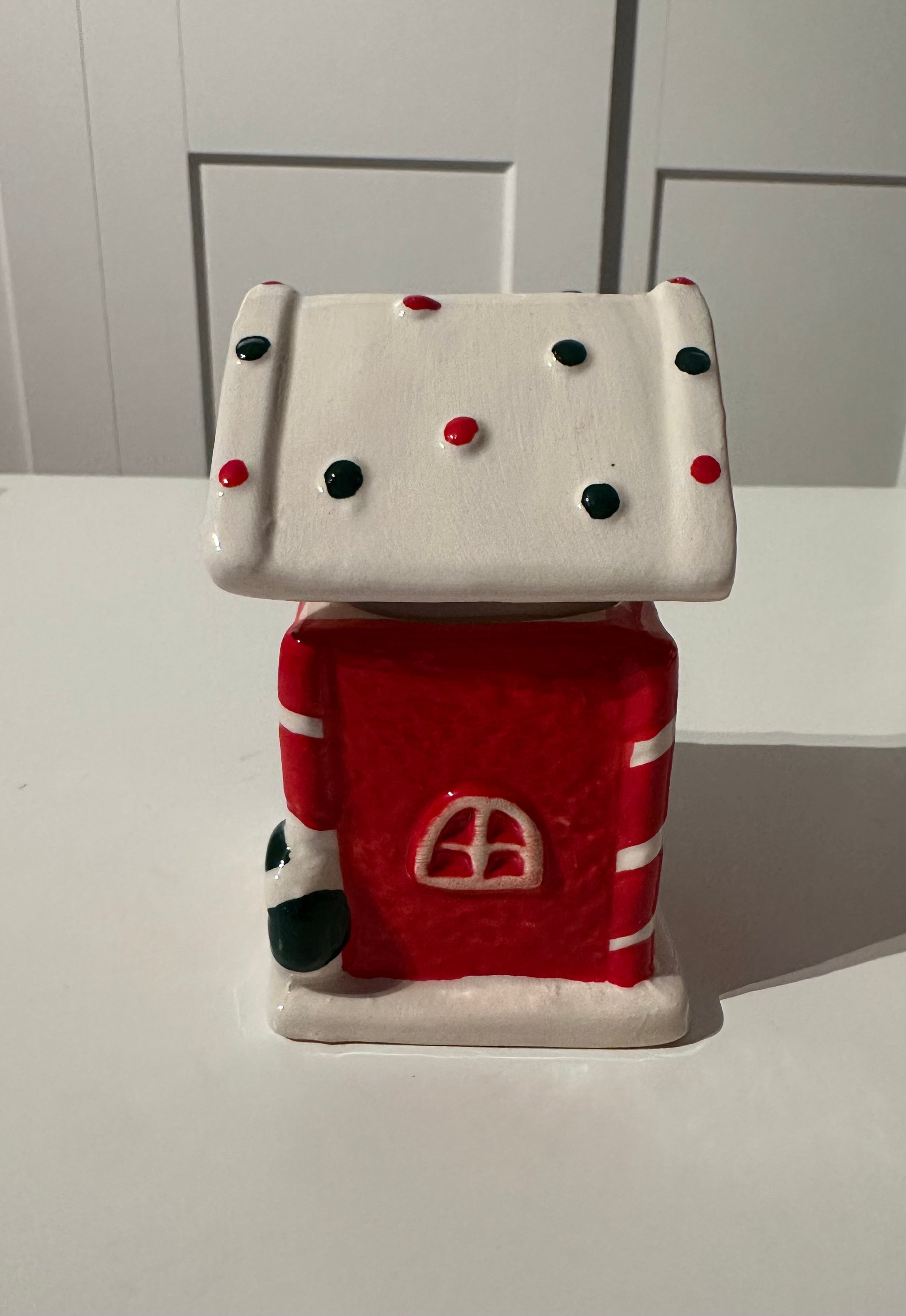 Kerze Winterhaus mit Schneemann