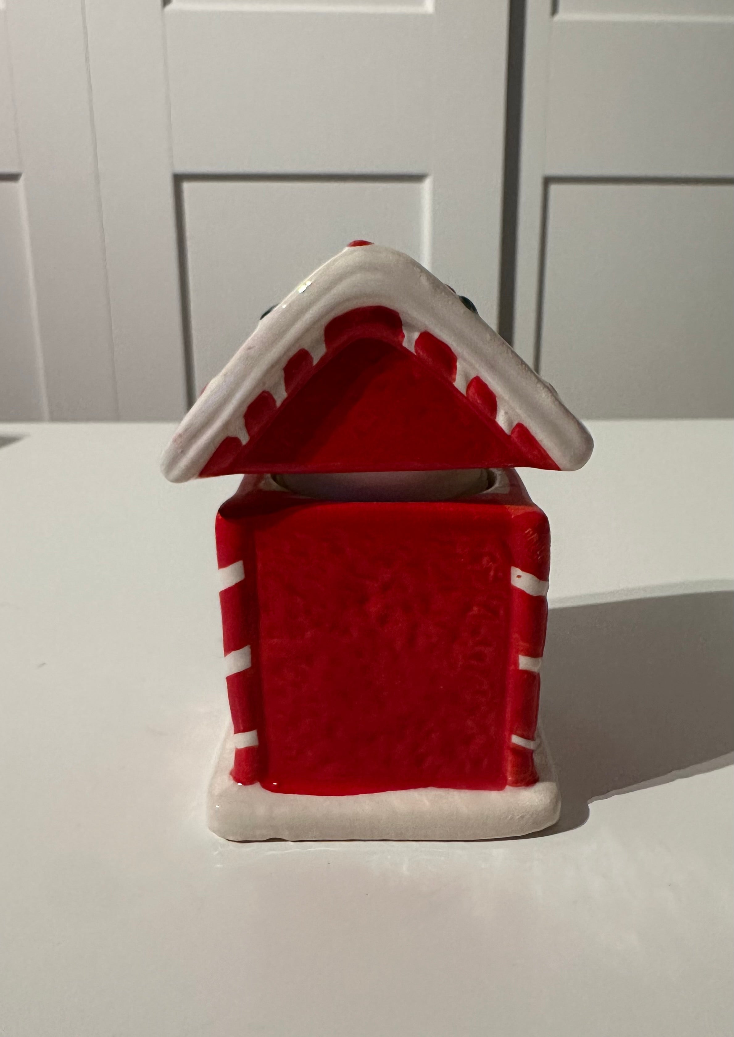 Kerze Winterhaus mit Schneemann